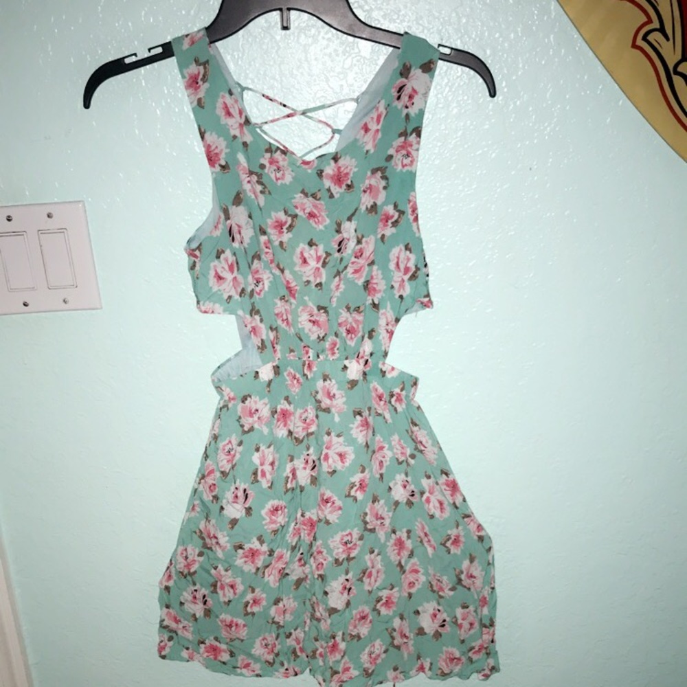 Turquoise dress with flower pattern